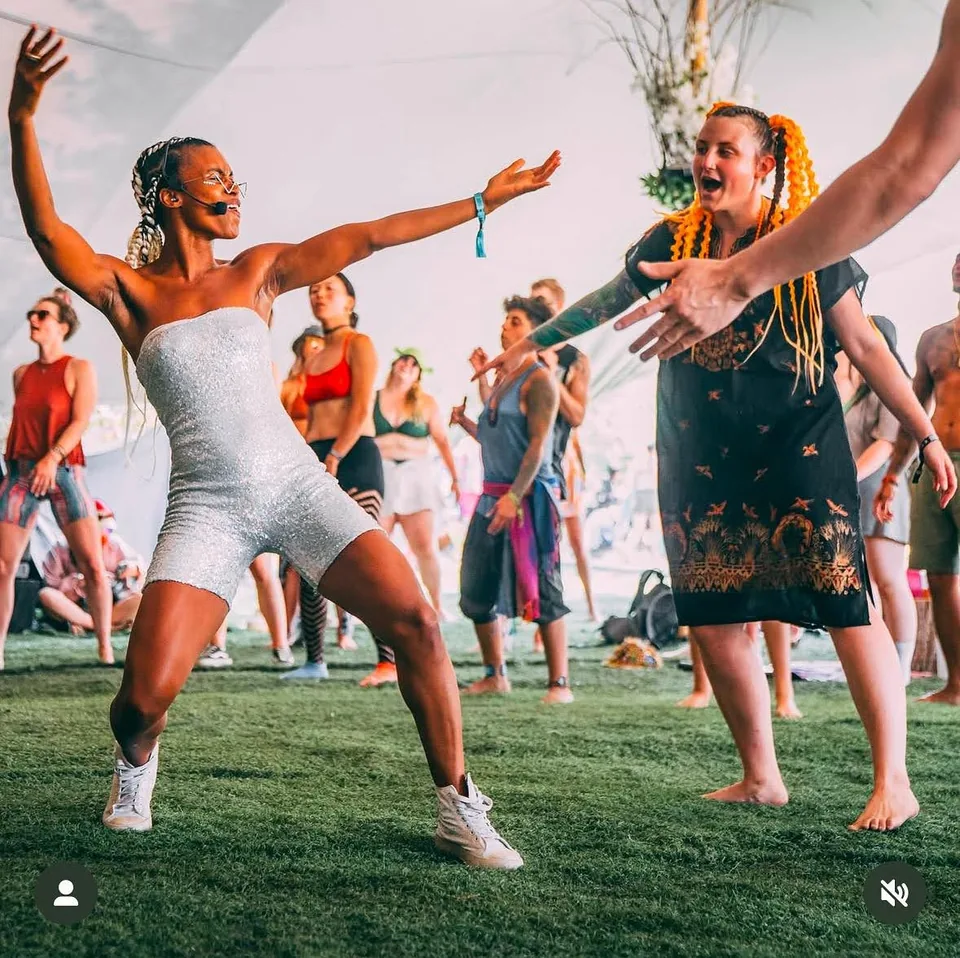 Pearl Cicci dancing at a lively sober social event
