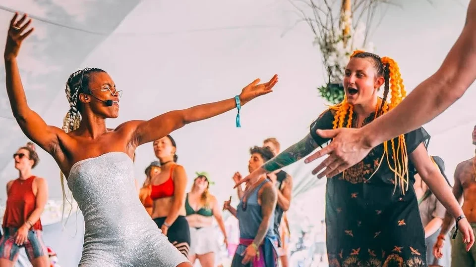 Pearl Cicci dancing at a lively sober social event